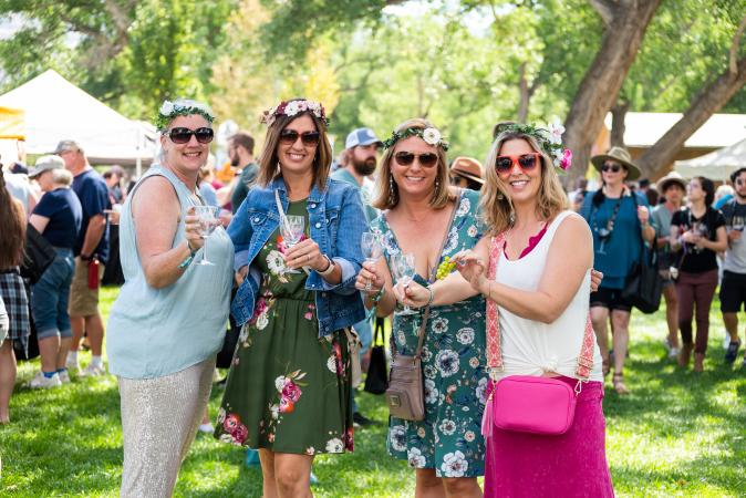 Picture of Four Women Standing Outside Drinking Wine