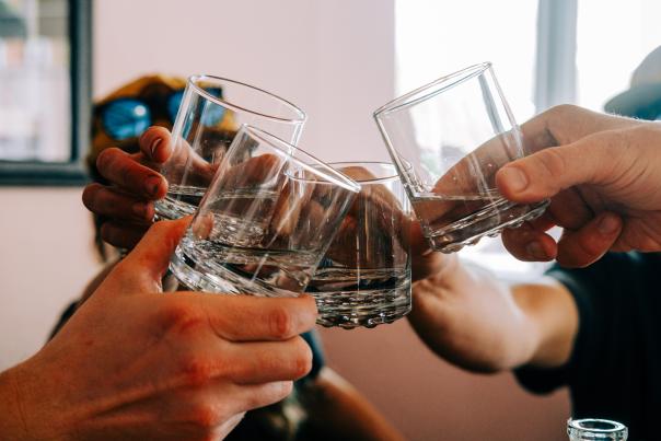 People Cheersing Cocktail Glasses