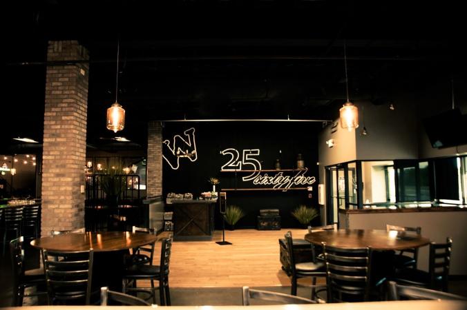 Picture of Warehouse Logo in Front of Tables and Chairs