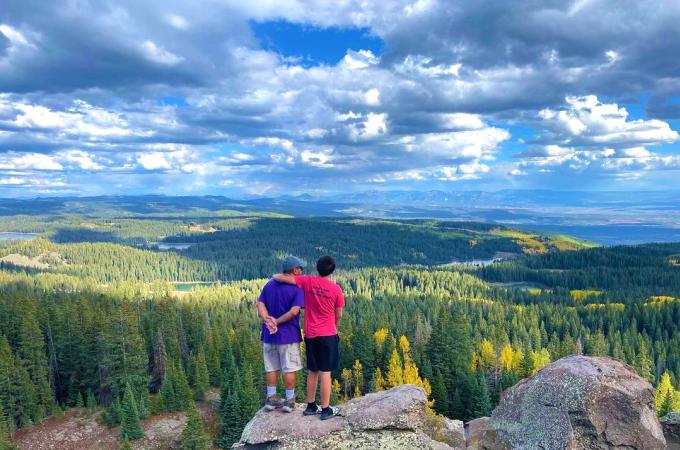 Two Kids Standing at Land O' Lakes Overlook in the Fall