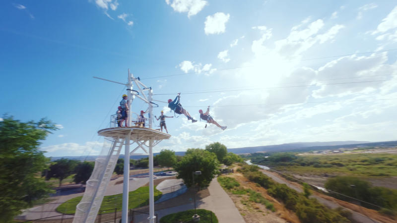 People Ziplining at Riverfront Zip Adventures