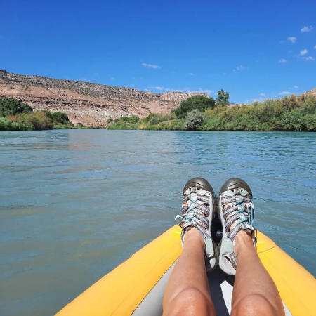 Feet on Paddle Board and Floating the Colorado River