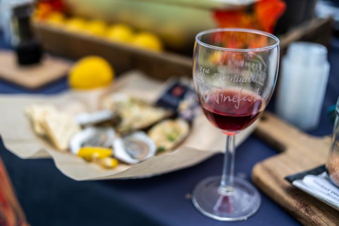 Picture of Glass of Wine in Front of Food