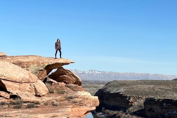 Woman Standing on Rock over the Colorado River