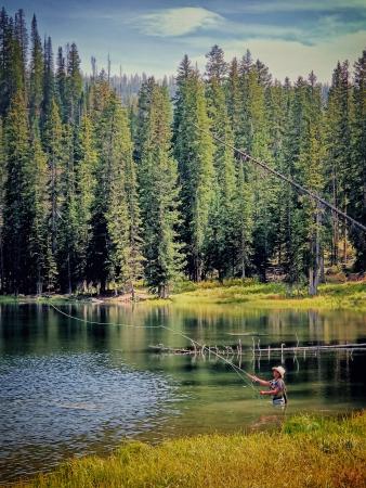 Man Fly Fishing at Beaver Lake on the Grand Mesa