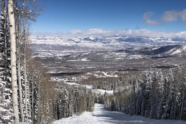 Landscape of Snowy Ski Run with Powderhorn Mountain Resort Below