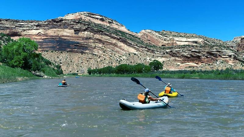 a group of people rafting on the Colorado River