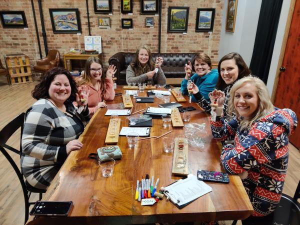 Picture of Women Sitting Around a Table