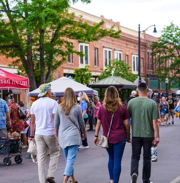 People walking around Market on Main in Downtown Grand Junction