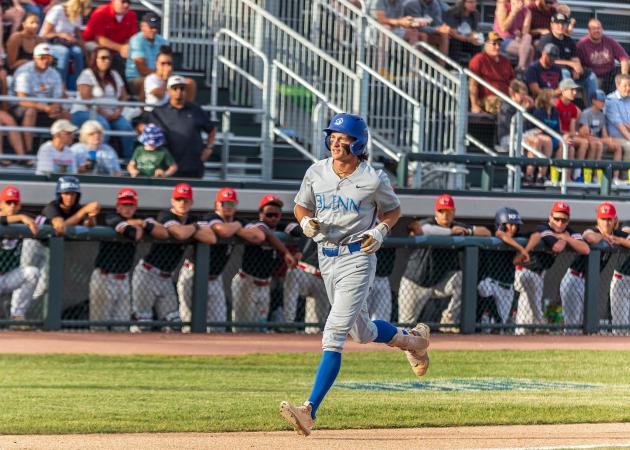JUCO Runner Rounding the Bases