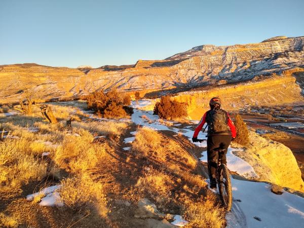 Person Mountain Biking in the Winter