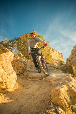 Mountain Biker Riding in the Winter