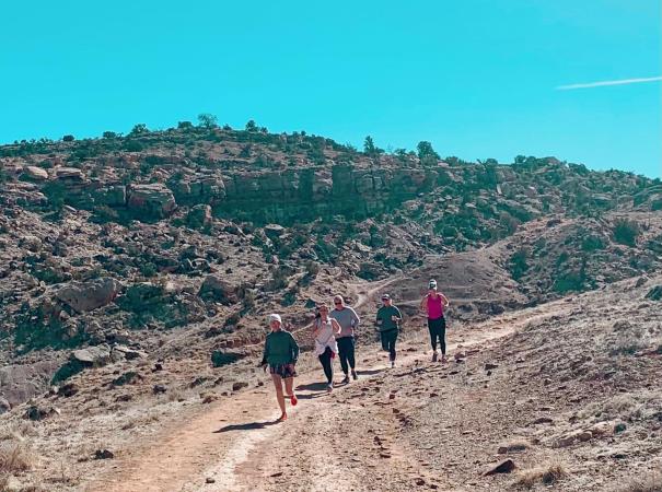 Five People running in the spring