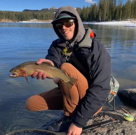Man Holding a Fish
