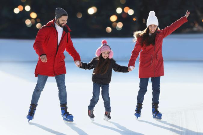 Parents and Child Ice Skating