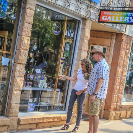 Man and Woman Shopping Downtown