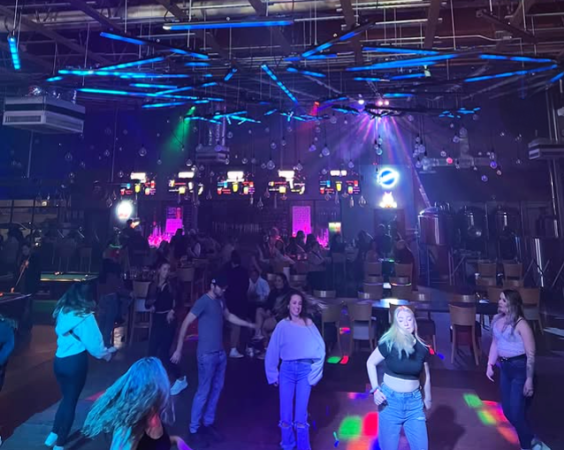 People Line Dancing at Mama Ree's